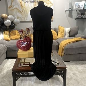 Lush long black backseat dress with elastic ways. Size medium